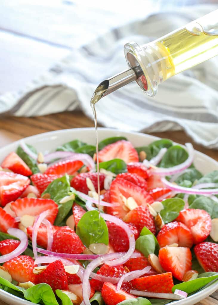 I look forward to this Classic Strawberry Spinach Salad every year when the berries are at their best! - get the recipe at barefeetinthekitchen.com