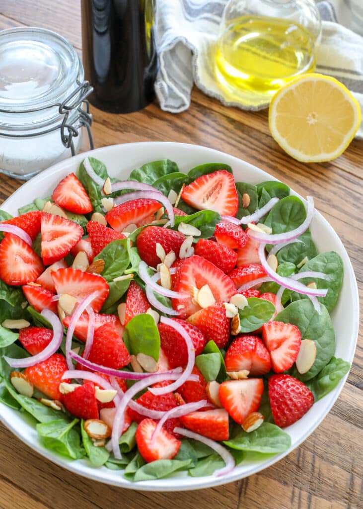 Classic Strawberry Spinach Salad is a favorite every year when the berries are at their best! - get the recipe at barefeetinthekitchen.com