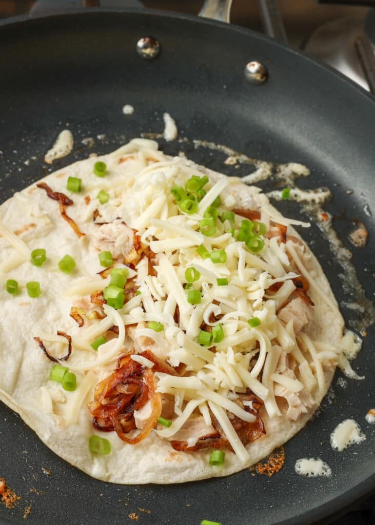 Caramelized Onion Chicken Quesadilla in skillet - 5
