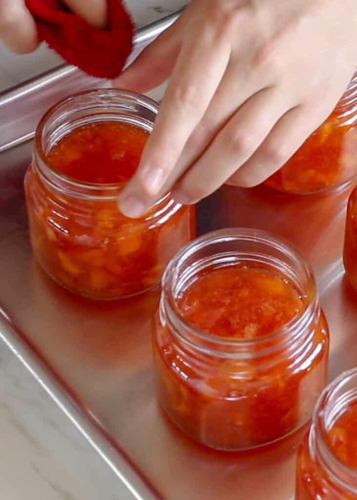 Don't forget to wipe any spills on the jar rims before processing and sealing - get the recipe at barefeetinthekitchen.com