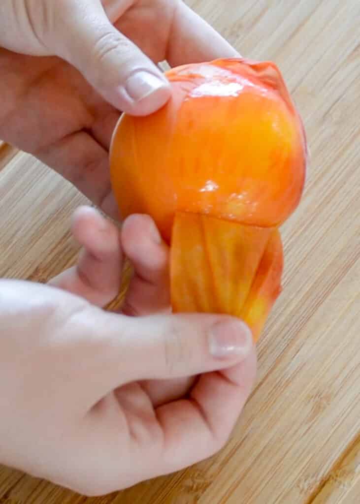 Get the tips for EASY peach peeling at barefeetinthekitchen.com