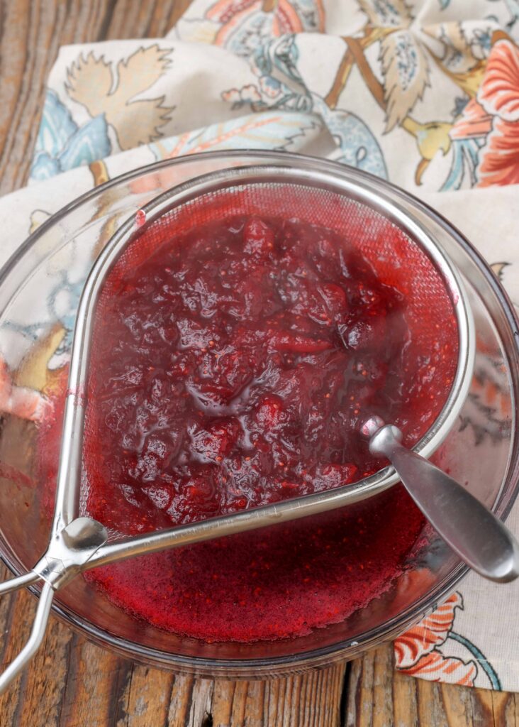strain the cranberry sauce for a smooth result