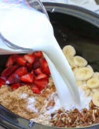 Slow Cooker Berry Banana Oatmeal is a family favorite - just combine it all when you wake up and breakfast will be ready when you are! get the recipe at barefeetinthekitchen.com