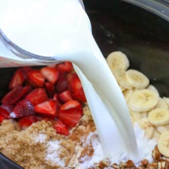 Slow Cooker Berry Banana Oatmeal is a family favorite - just combine it all when you wake up and breakfast will be ready when you are! get the recipe at barefeetinthekitchen.com