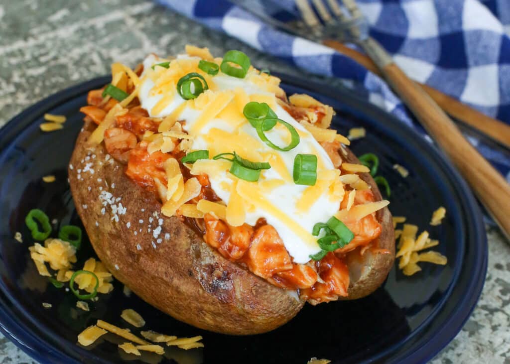 BBQ Chicken Stuffed Potatoes are a family favorite! get the recipe at barefeetinthekitchen.com