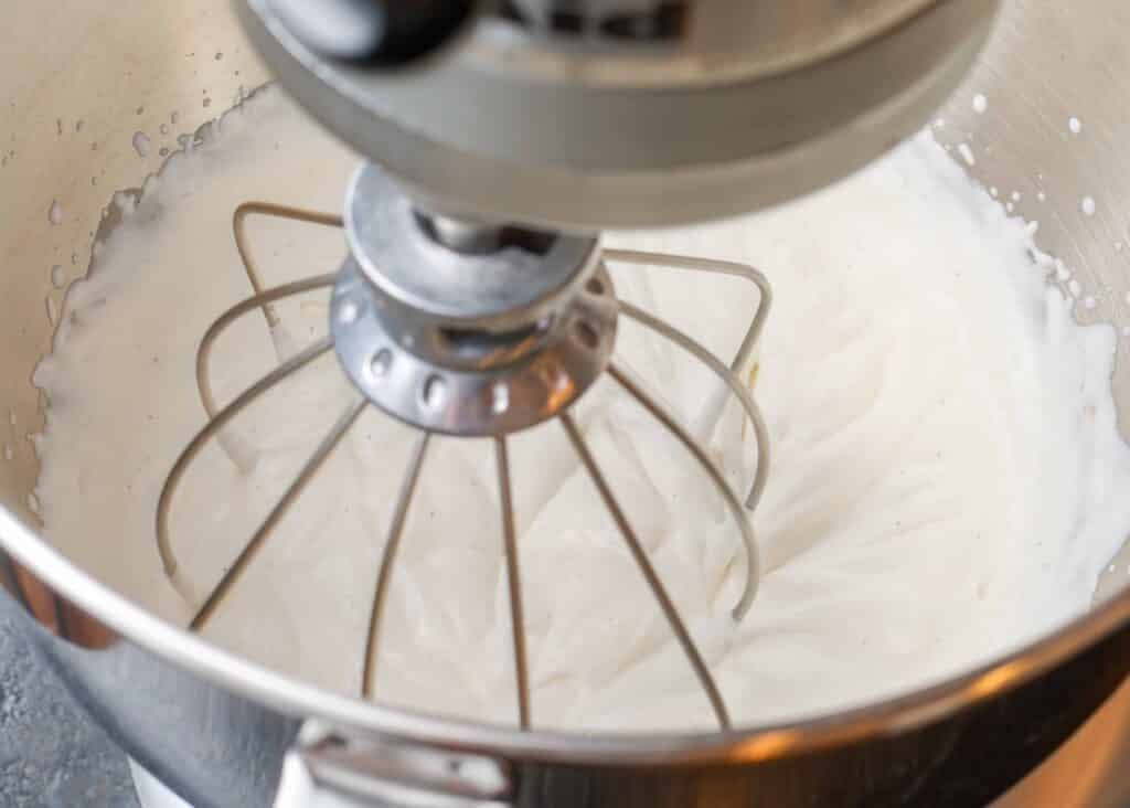 Fluffy fresh cream with a stand mixer