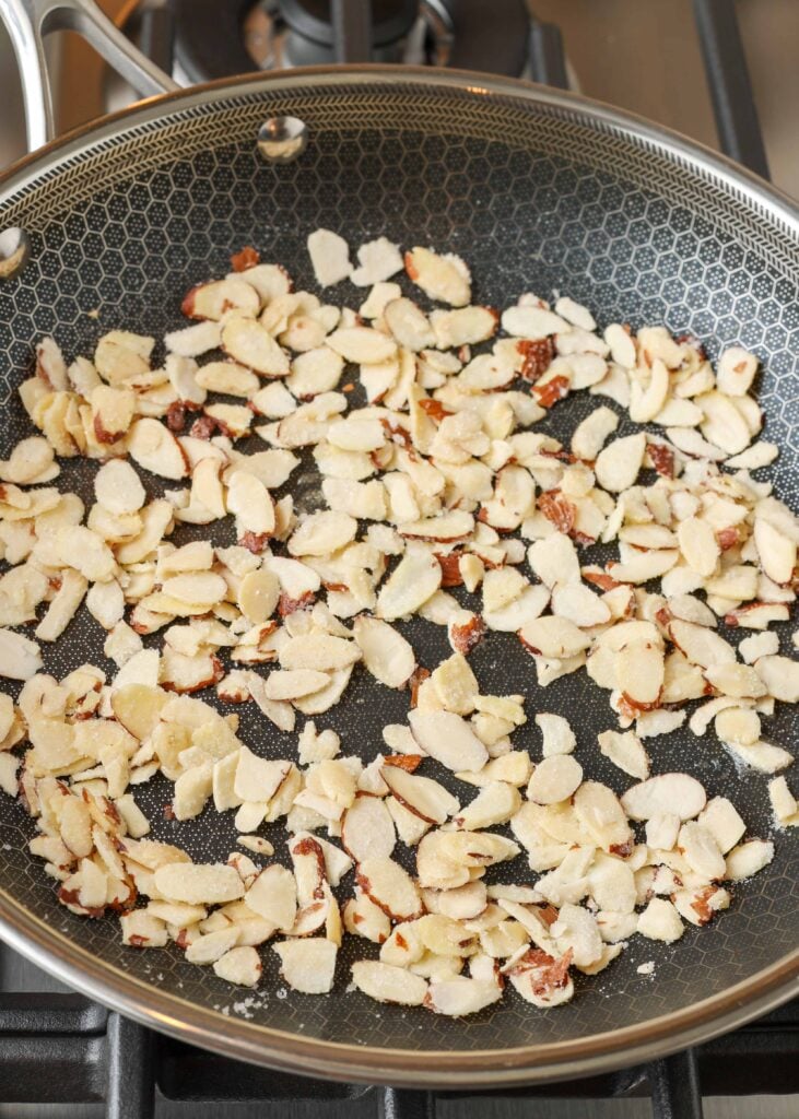 almonds with sugar in a skillet