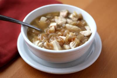 A bowl of soup, with Chicken
