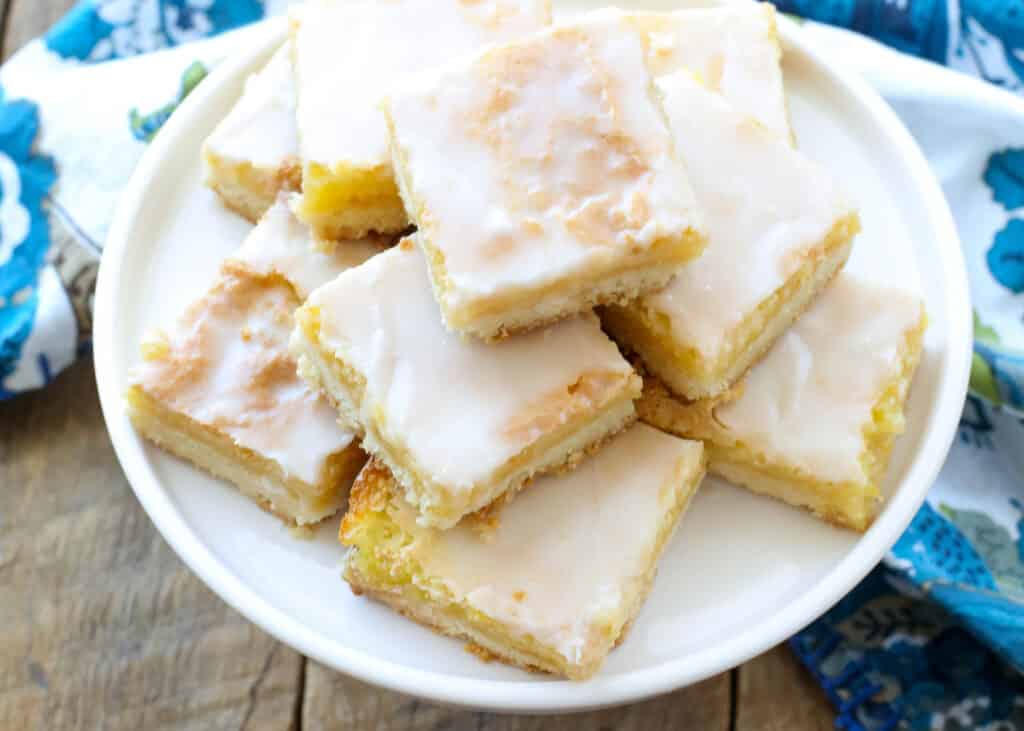 Sunburst Lemon Bars are a dreamy dessert that no one is able to resist! get the recipe at barefeetinthekitchen.com