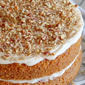 This Carrot Cake is everything I want in a dessert! Topped with cream cheese frosting, it's pure heaven! get the recipe at barefeetinthekitchen.com