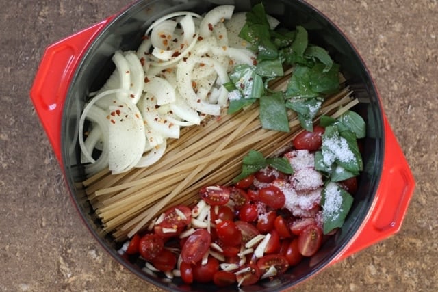 A bowl of fruit salad, with Pasta and Basil