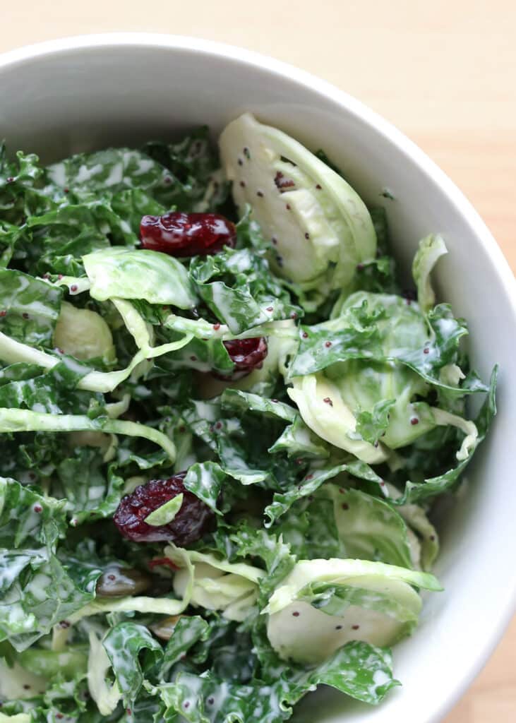 Sweet Kale Salad is a personal favorite all year long! get the recipe at barefeetinthekitchen.com