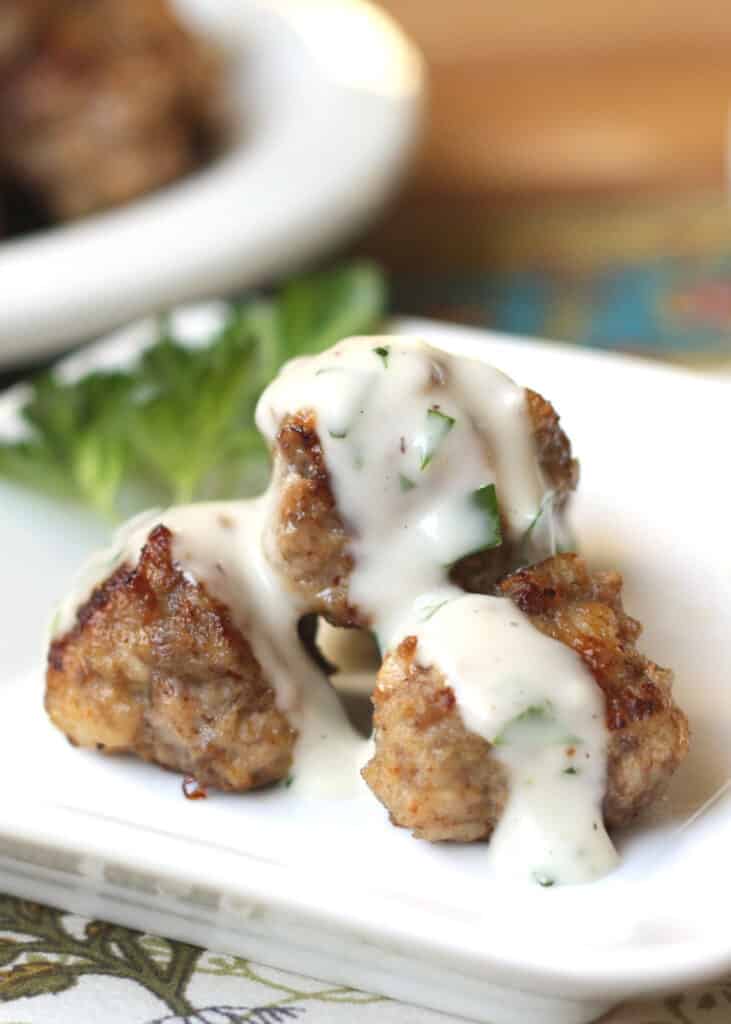 The BEST Swedish Meatballs with a light cream sauce - recipe by Barefeet In The Kitchen