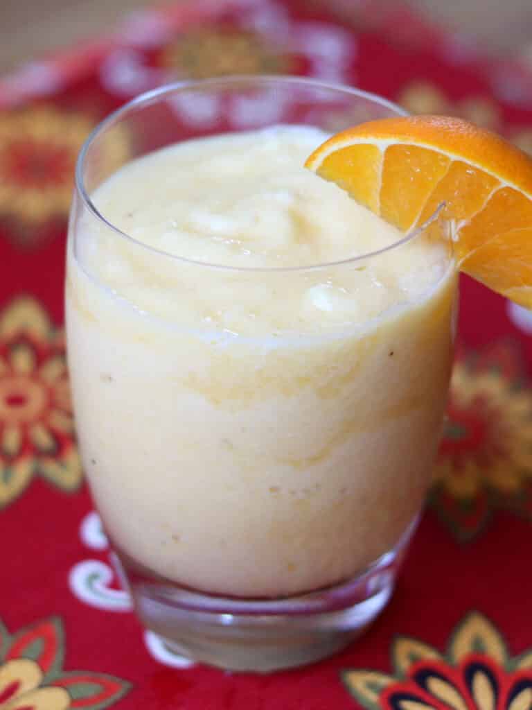 This fruit filled dairy-free Pineapple Orange Banana Smoothie is perfect for breakfast or an after dinner treat! 