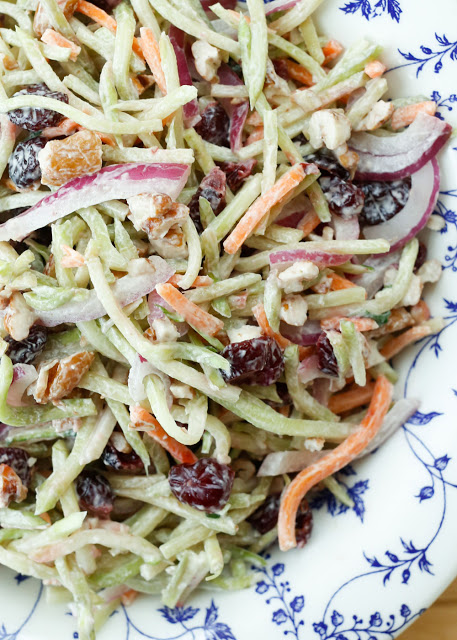 Sweet and Tangy Broccoli Slaw is a light summer side perfect for any occasion! - get the recipe at barefeetinthekitchen.com