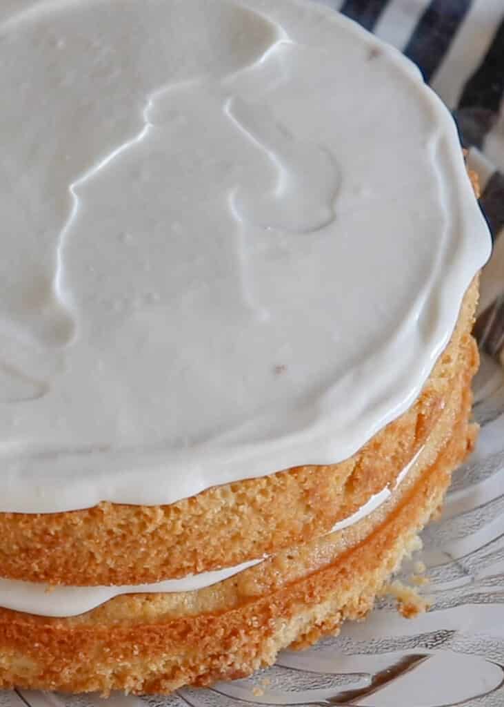 Fluffy Coconut Frosting - get the recipe at barefeetinthekitchen.com
