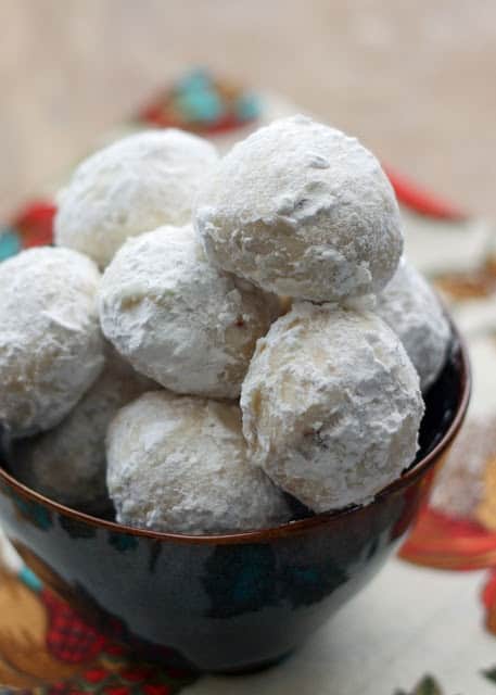 Mexican Wedding Cookies, Russian Tea Cakes, Sugar Butter Balls, Polvorones, Snowball Cookies, Egyptian Feast Cookies, Nut Butter Balls, Norwegian Snowballs, Kourambie, Walnut Delights, Pecan Petites, Holiday Nuggets, Swedish Heirloom Cookies, these melt-in-your-mouth cookies are known by many different names around the world. Get the recipe at barefeetinthekitchen.com