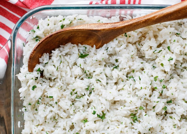 {Oven Baked} Cilantro Lime Rice is a great side dish for any meal. - get the recipe at barefeetinthekitchen.com