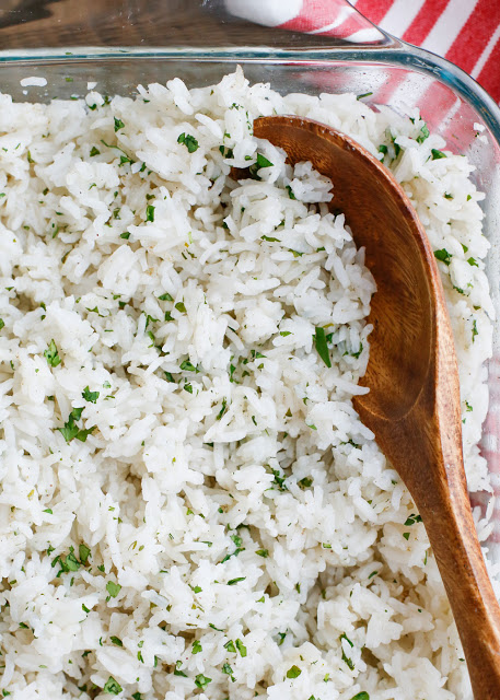 {Oven Baked} Cilantro Lime Rice is a simple side dish that is perfect for any meal. - get the recipe at barefeetinthekitchen.com