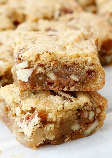 Praline Blondies are a crisp, buttery, brown sugar bar that is perfect on its own or with a scoop of ice cream on top!