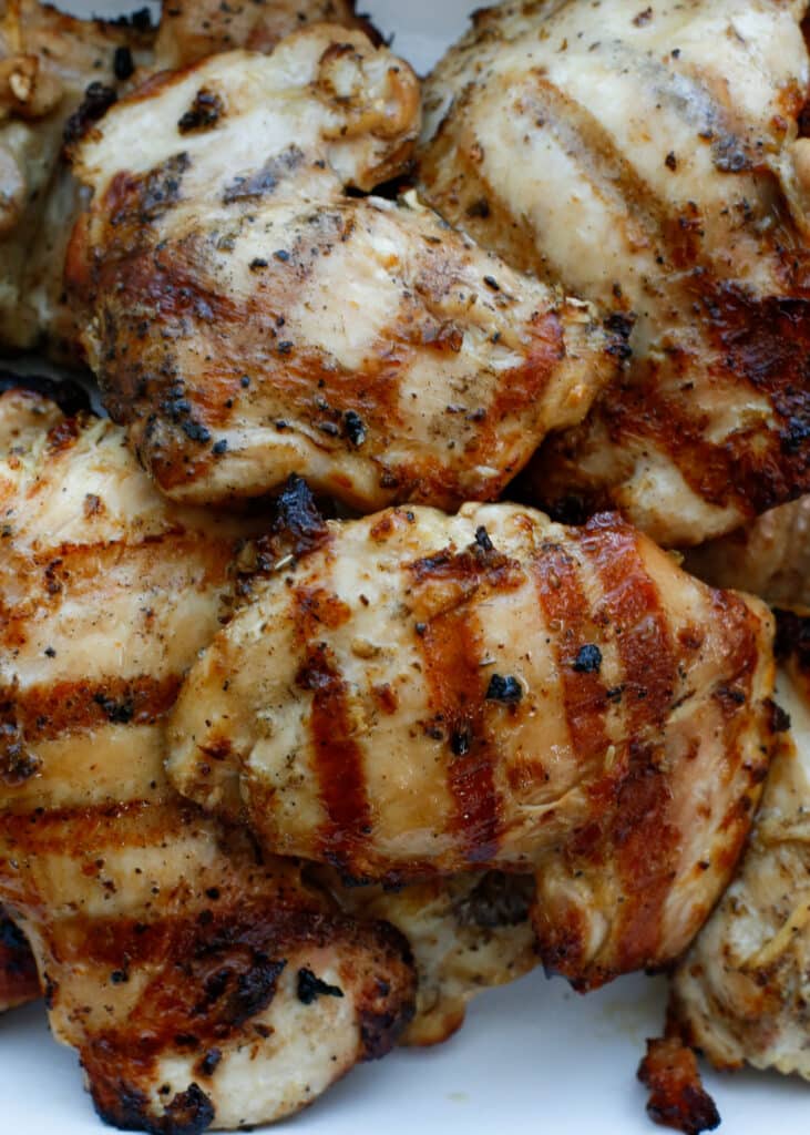A close up of a plate of food, with Chicken and Grilling