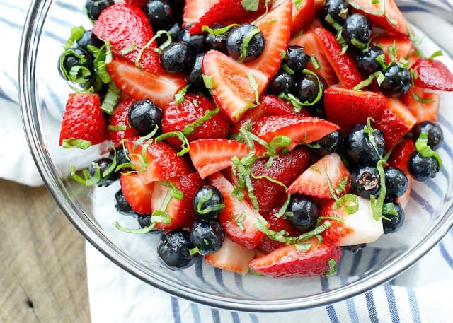 Balsamic and Basil Berry Salad is the ultimate summer fruit salad! get the recipe at barefeetinthekitchen.com