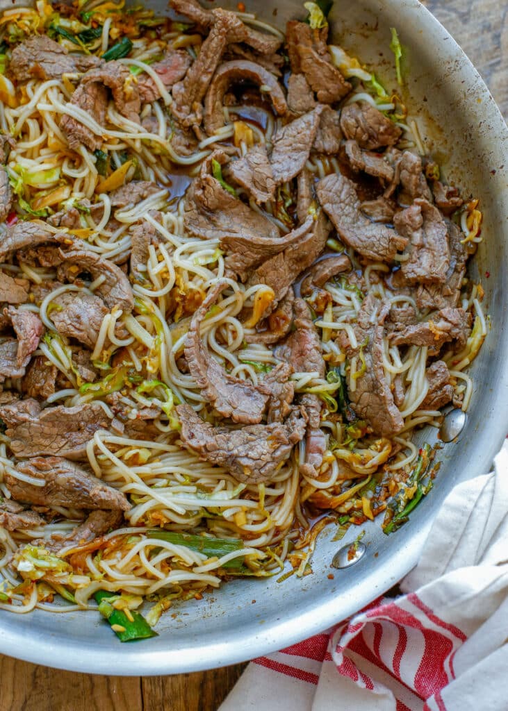 Mongolian Beef Noodle Bowls are tastier than take-out and you're sure to love them! get the recipe at barefeetinthekitchen.com
