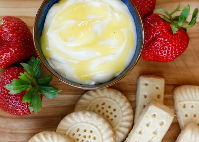 Creamy Lemon Dip with Shortbread and Strawberries is a light summery dessert that is perfect for sharing with friends or family.
