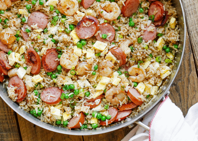 Kielbasa and Shrimp Fried Rice is a kid-approved EASY dinner! Get the recipe at barefeetinthekitchen.com
