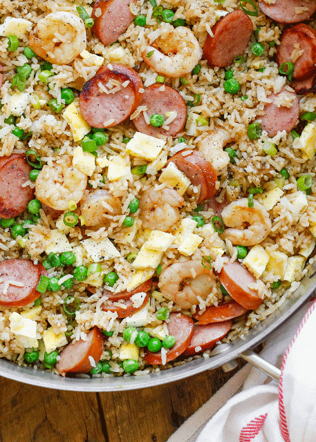 Kielbasa and Shrimp Fried Rice is a quick and easy weeknight dinner! Get the recipe at barefeetinthekitchen.com