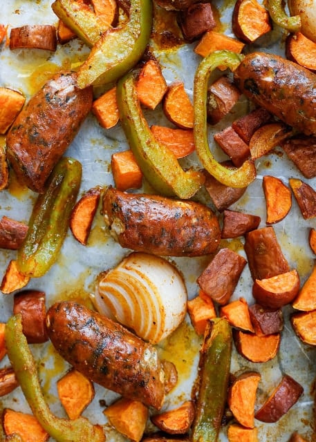 Sheet Pan Roasted Sausage with Sweet Potatoes and Peppers - get this easy dinner recipe at barefeetinthekitchen.com