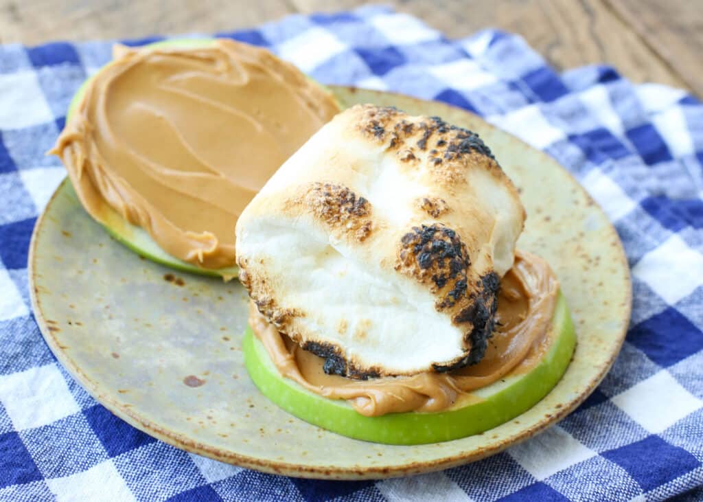 Green Apple S'mores are a camping treat no one will forget! get the recipe at barefeetinthekitchen.com