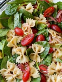 Spinach Pasta Salad is the perfect dinner on a warm summer night. Get the recipe at barefeetinthekitchen.com