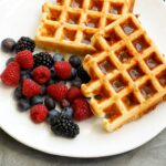 Ham and Cheese Waffles are a sweet and savory breakfast that the whole family will love! get the recipe at barefeetinthekitchen.com