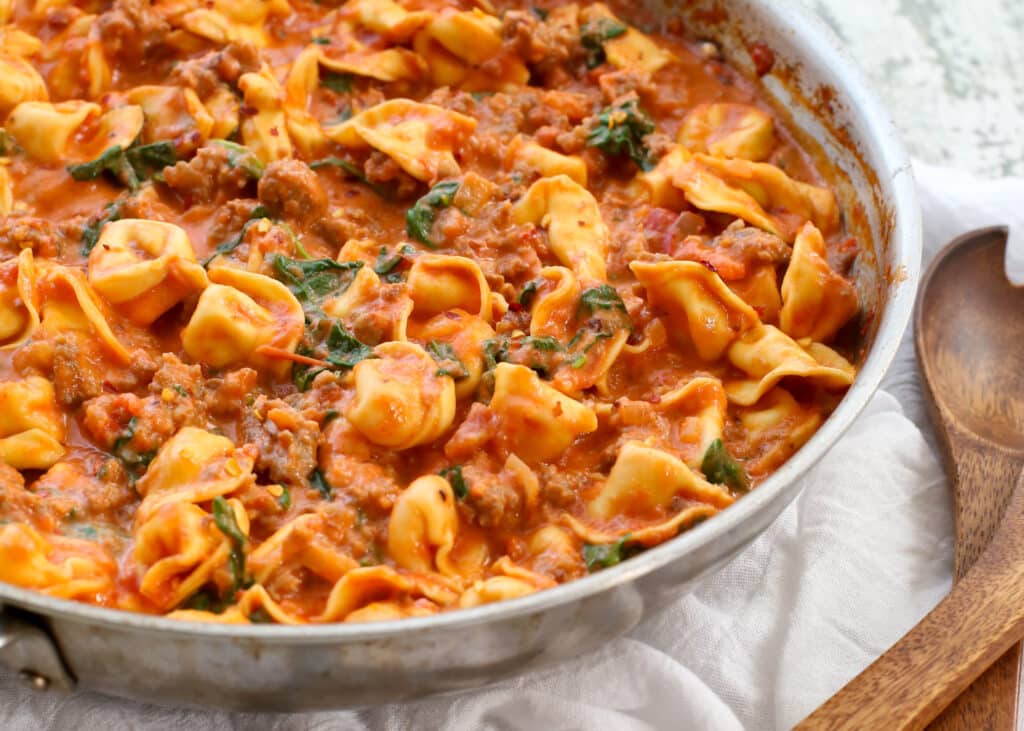 Creamy Sausage and Spinach Tortellini Skillet
