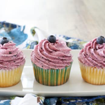 Fresh Blueberry Frosting is a dream come true for any berry lover! get the recipe at barefeetinthekitchen.com