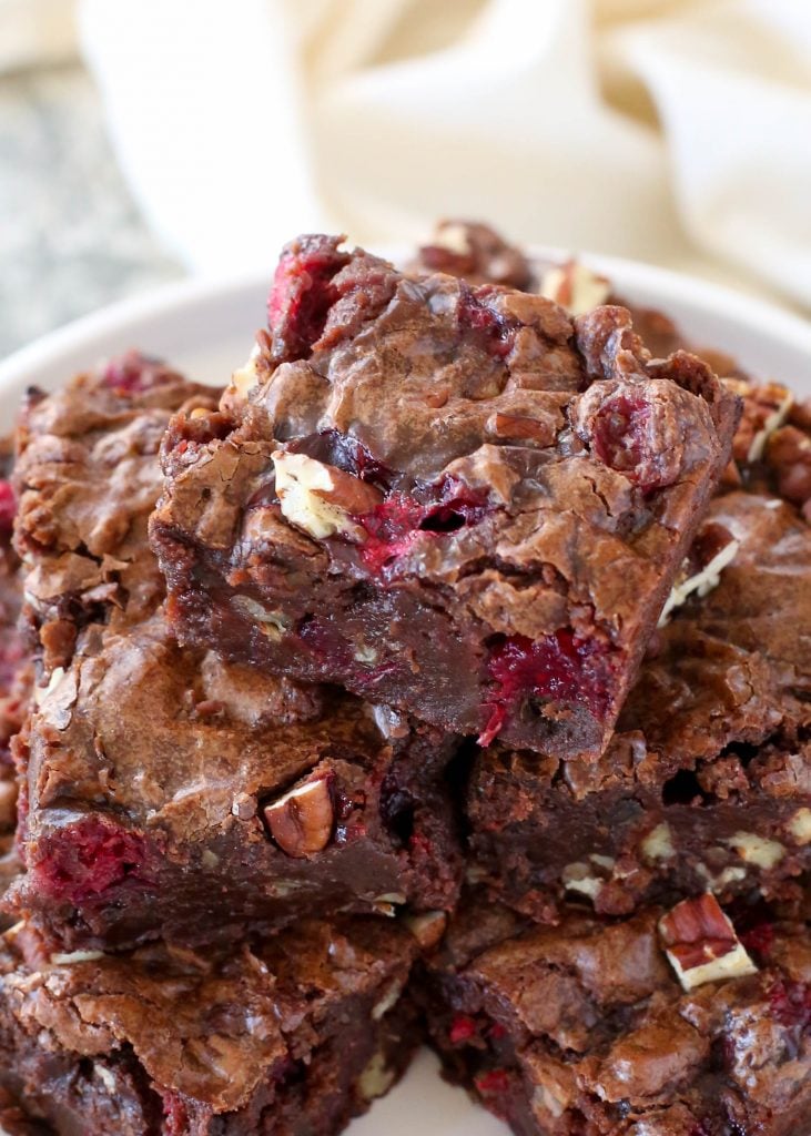 Cranberry Pecan Brownies are generously filled with tart cranberries and crunchy pecans - get the recipe at barefeetinthekitchen.com