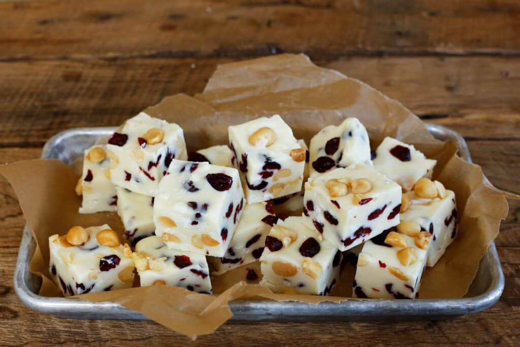 Cranberry Macadamia Nut Fudge is an easy holiday treat that comes together in minutes! get the recipe at barefeetinthekitchen.com
