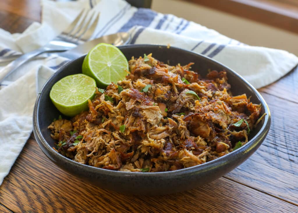 Slow Cooker Pork Carnitas are a time saving way to get all that awesome carnitas flavor with a minimum of effort! - get the recipe at barefeetinthekitchen