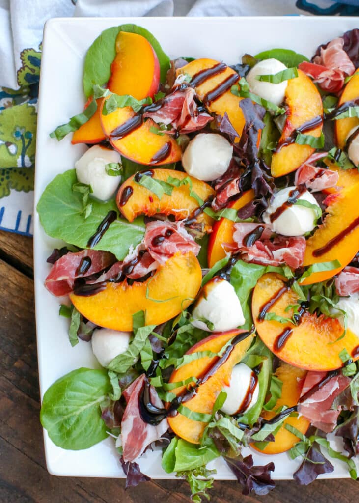 Peach Salad with Mozzarella and Prosciutto is a summer favorite! - get the recipe at barefeetinthekitchen.com