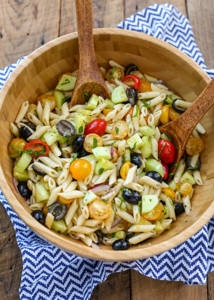 This Tangy Mediterranean Pasta Salad is a mayo-free salad that is perfect for summer parties! get the recipe at barefeetinthekitchen.com