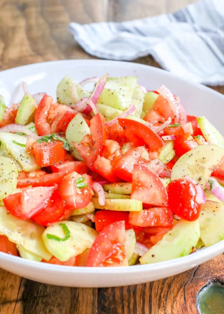Cucumbers, tomatoes, and onions are a perfect salad match.
