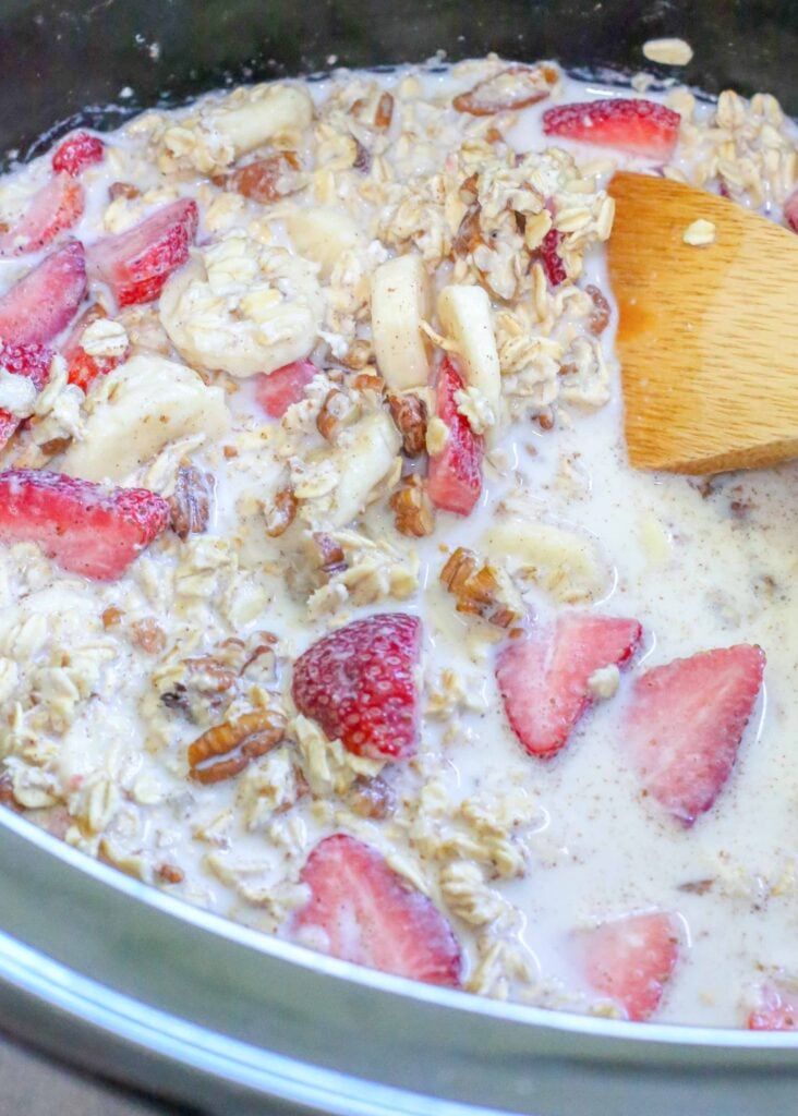 Creamy oatmeal filled with strawberries, bananas, and nuts