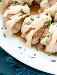 In just under 20 minutes, you can have these Pan Fried Pork Medallions in a Creamy Wine Sauce on the table! get the recipe at barefeetinthekitchen.com
