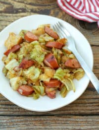 Cabbage and Sausage One-Pan Meal is a hearty dinner that everyone loves! get the recipe at barefeetinthekitchen.com