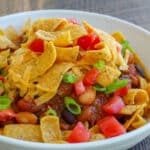 Cheesy, crunchy, slightly spicy, Frito Pie is a dinner that always gets cheers!