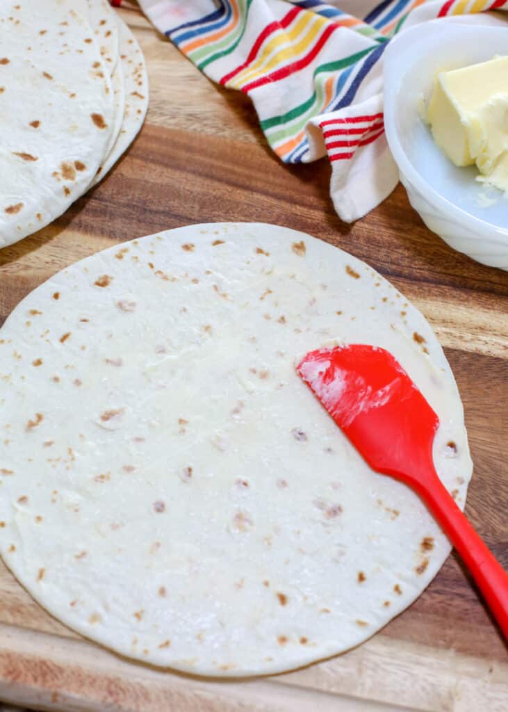 The not-so-secret ingredient for making PERFECT quesadillas at home is BUTTER!