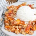 peach crunch on small plate with ice cream