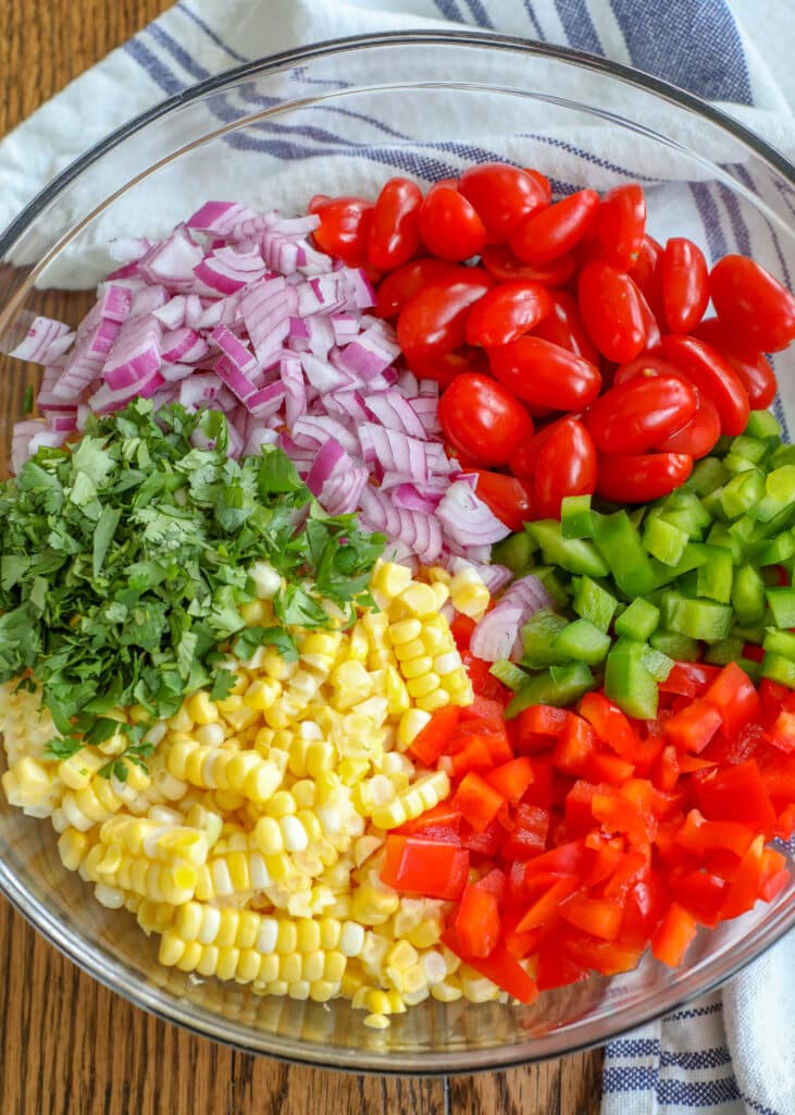 Summer Corn Salad with fresh corn, bell peppers, tomatoes, onion, and cilantro