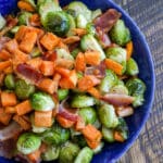 Roasted sweet potatoes with Brussels sprouts and bacon is a fantastic side dish for any meal